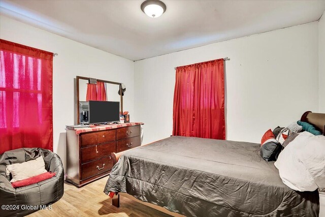 bedroom featuring light wood-type flooring
