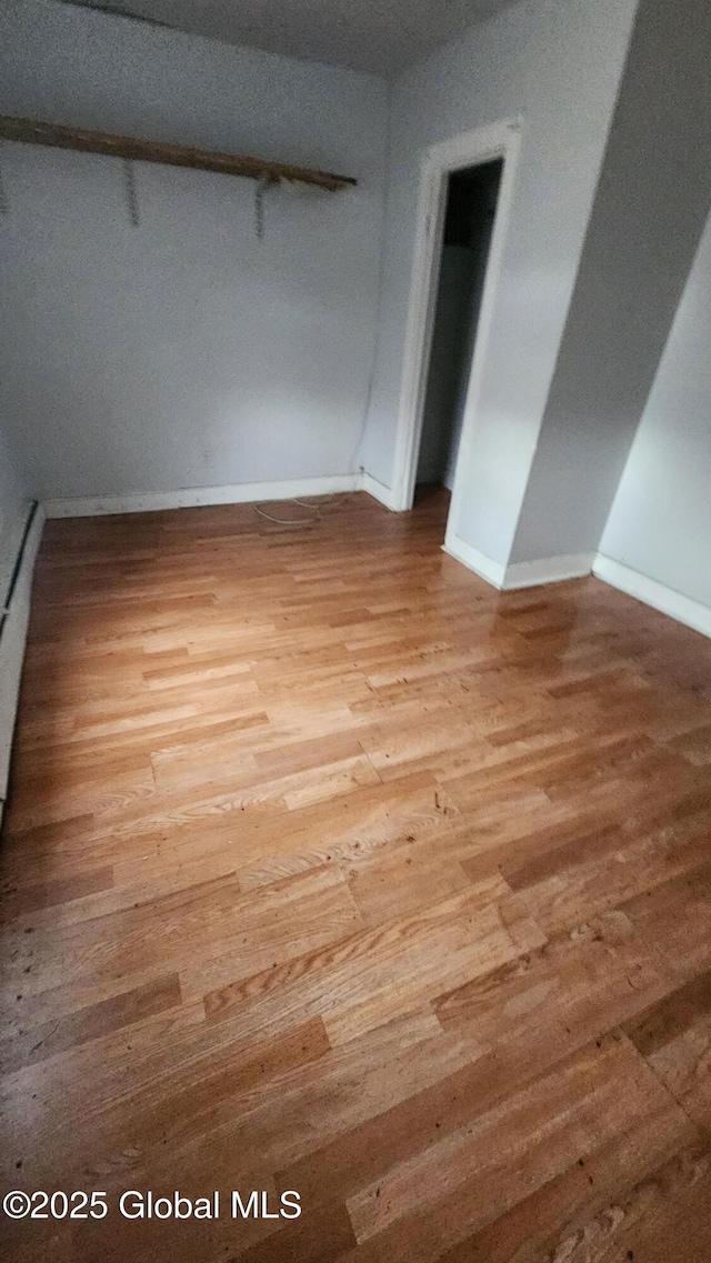 empty room featuring hardwood / wood-style floors