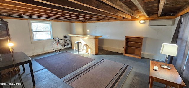 basement featuring a wall mounted air conditioner