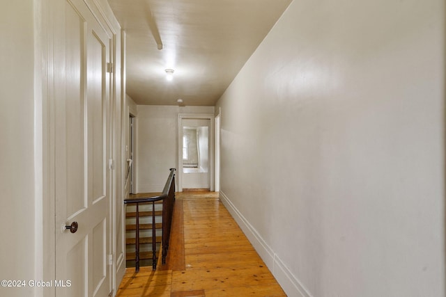 hallway featuring light hardwood / wood-style flooring