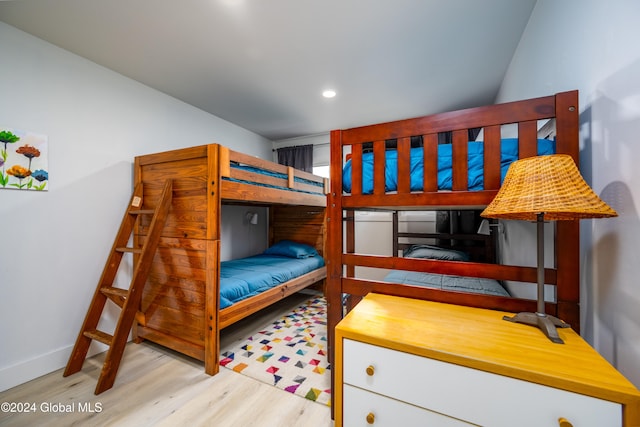 bedroom with light wood-type flooring