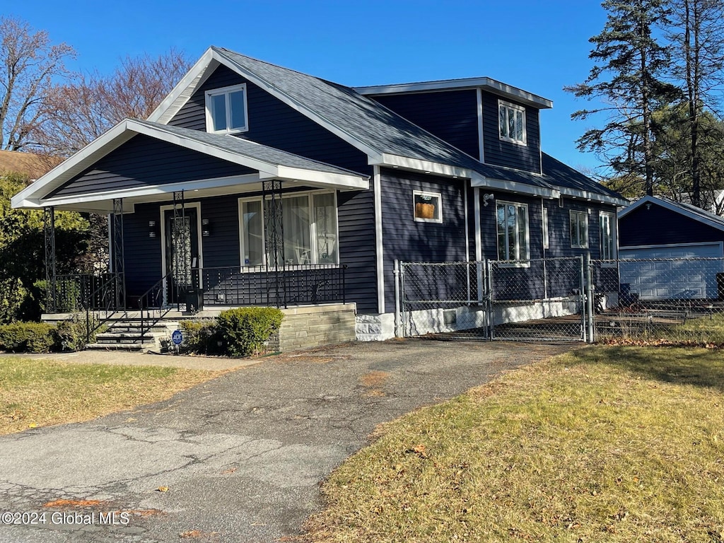 3266 Taylor St, Rotterdam, NY 12306 - view of front facade with a front yard and a porch