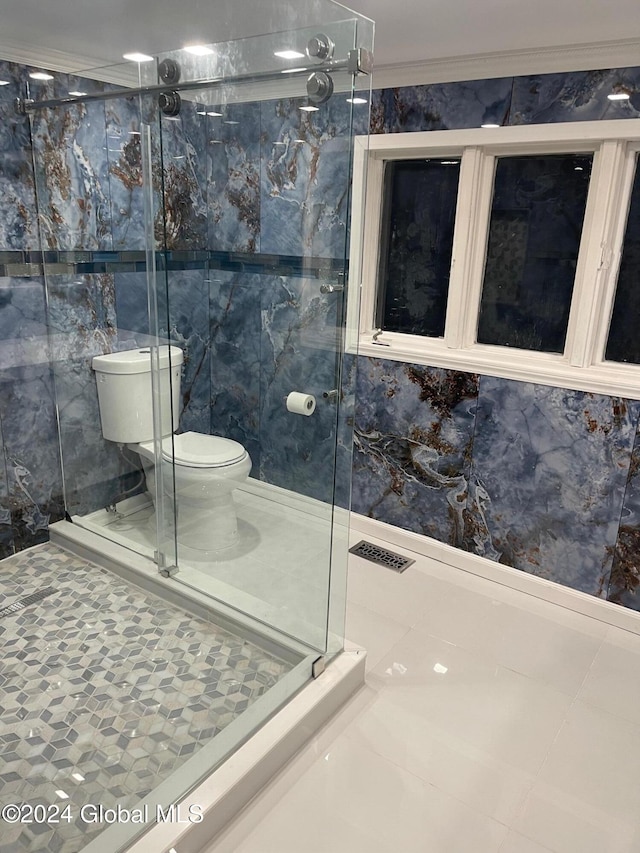 bathroom with crown molding, an enclosed shower, tile walls, and toilet