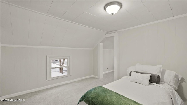 bedroom featuring carpet floors and lofted ceiling