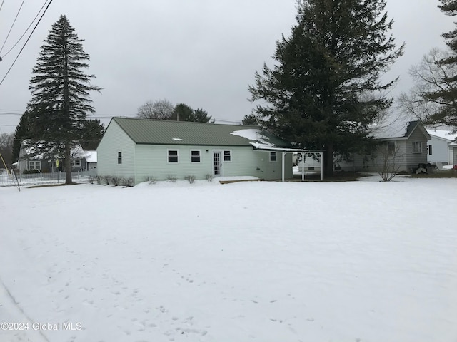 view of snow covered property