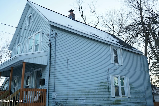 view of home's exterior featuring covered porch