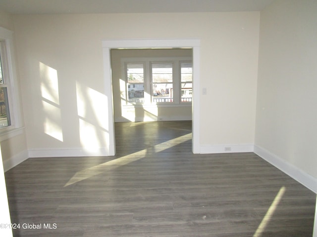 empty room featuring dark hardwood / wood-style floors