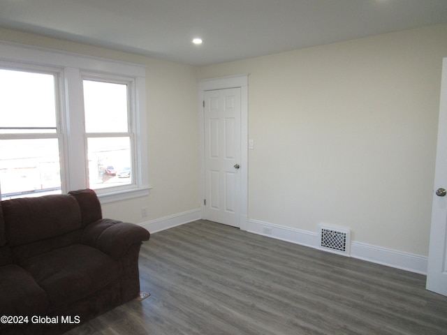 living area featuring dark hardwood / wood-style floors