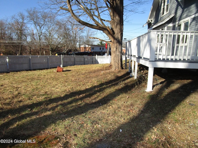 view of yard with a wooden deck