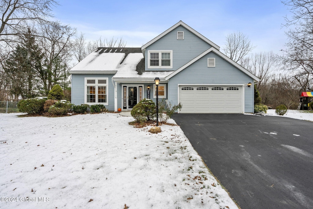 front of property featuring a garage