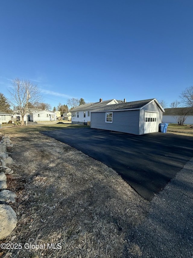 view of home's exterior with a garage