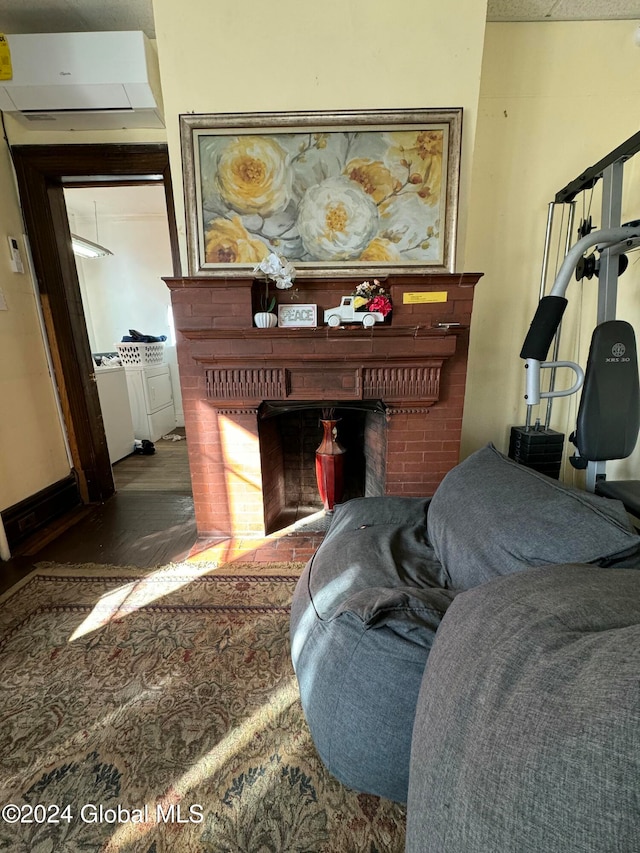 living room with a fireplace and dark hardwood / wood-style floors