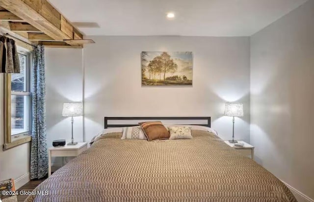 bedroom with wood-type flooring