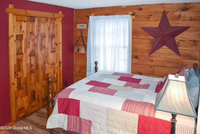 bedroom featuring wood-type flooring