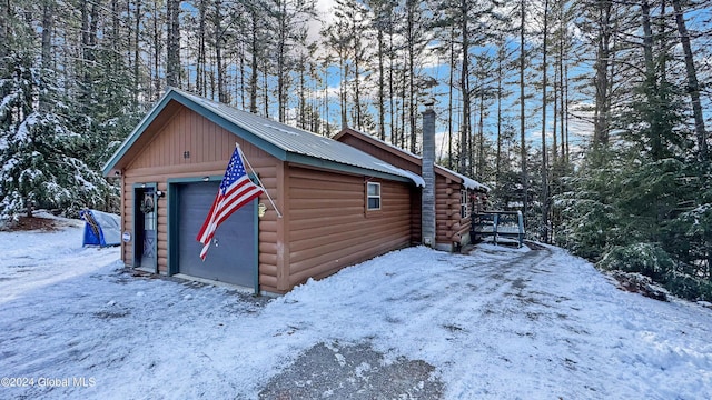 exterior space featuring a garage