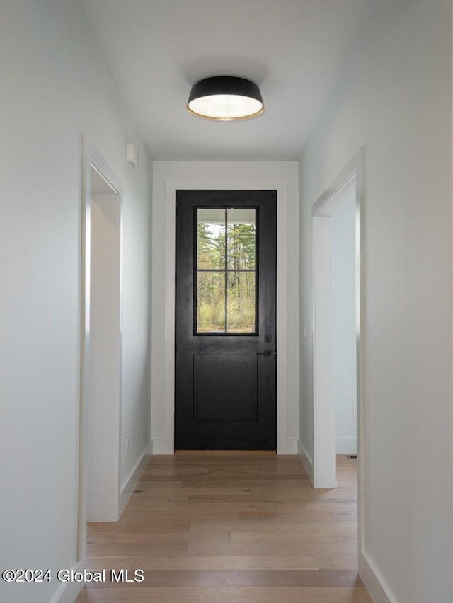 doorway featuring light hardwood / wood-style floors