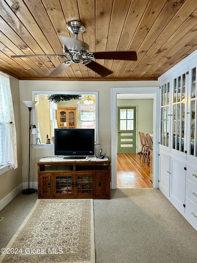 living room featuring wood ceiling and light hardwood / wood-style flooring