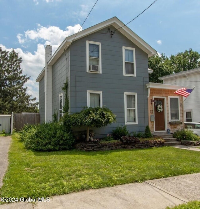 view of front of house featuring a front lawn