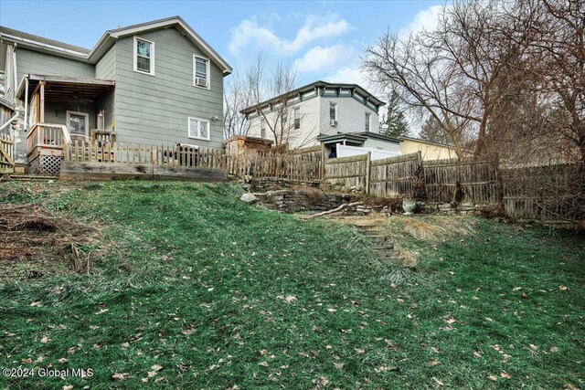 24 Wagner St, Fort Plain, NY 13339 - rear view of property with a wooden deck