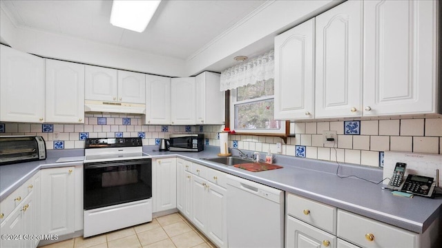 kitchen with white appliances, backsplash, crown molding, light tile patterned flooring, and white cabinetry