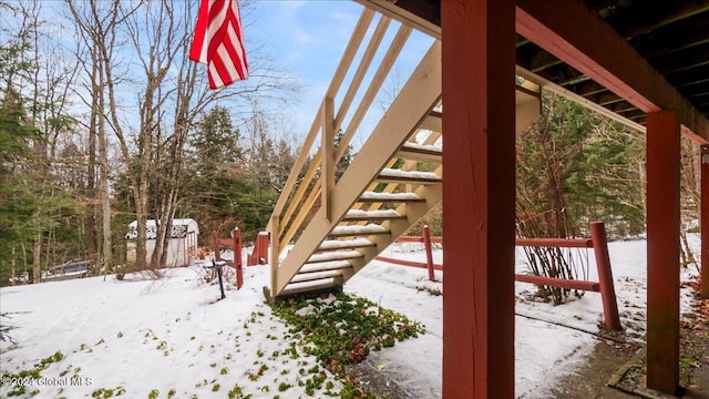 view of yard covered in snow