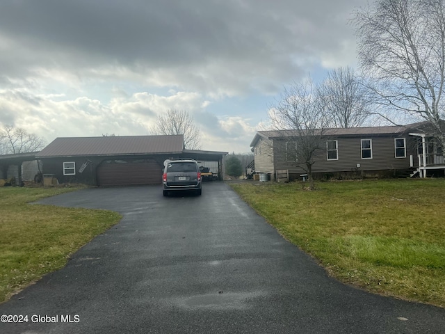 238 Mcewan Rd, Canajoharie, NY 13317 - view of front of home with a front yard and driveway