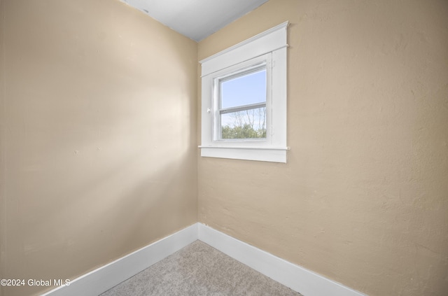 empty room with carpet flooring