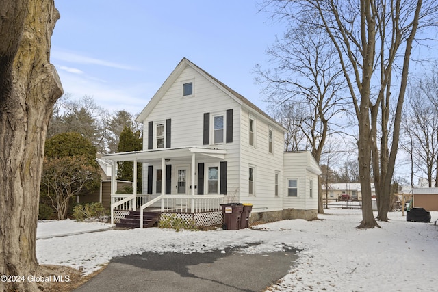 view of front of home featuring covered porch