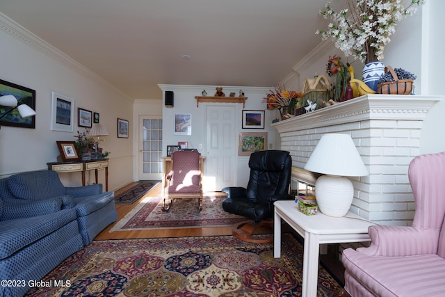 living room featuring wood-type flooring and crown molding