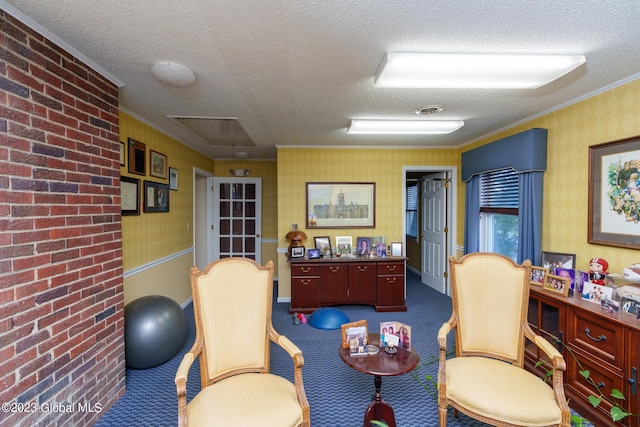 interior space with dark colored carpet, a textured ceiling, and ornamental molding