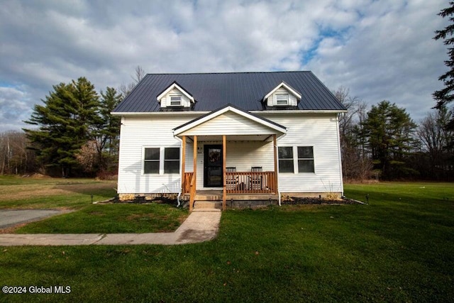 view of front of home with a front lawn and covered porch