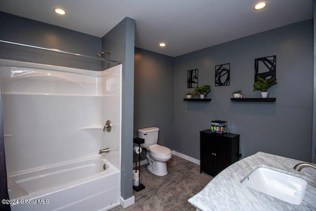 full bathroom featuring bathing tub / shower combination, vanity, and toilet