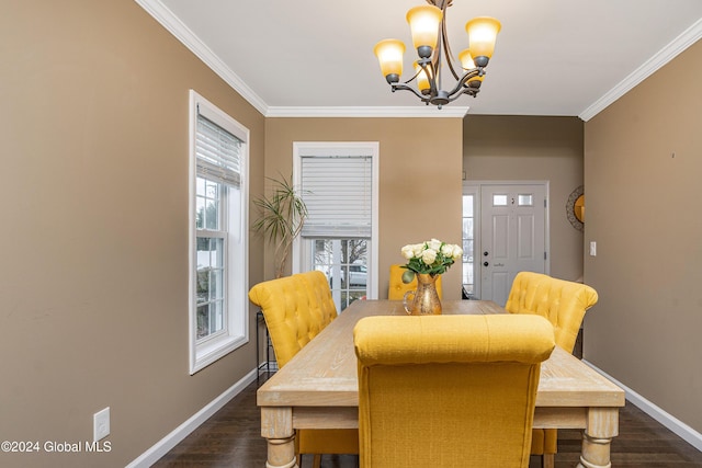 dining space with ornamental molding, dark hardwood / wood-style floors, and a notable chandelier