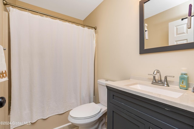 full bathroom with shower / bathtub combination with curtain, vanity, and toilet