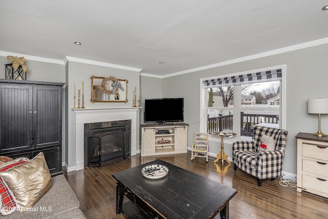 living room with dark hardwood / wood-style floors and ornamental molding