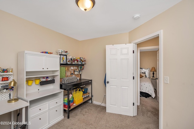 playroom featuring light colored carpet