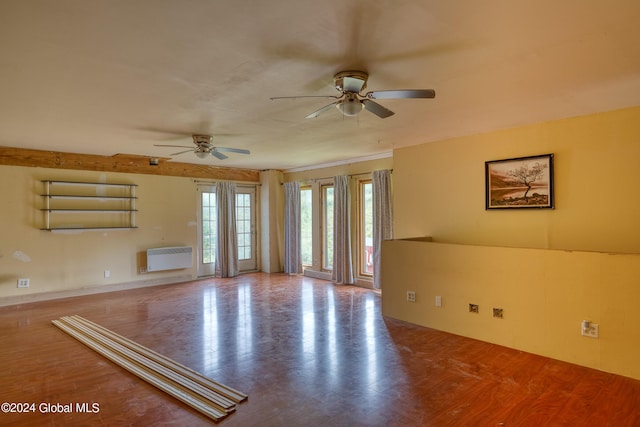 unfurnished room featuring ceiling fan and wood-type flooring