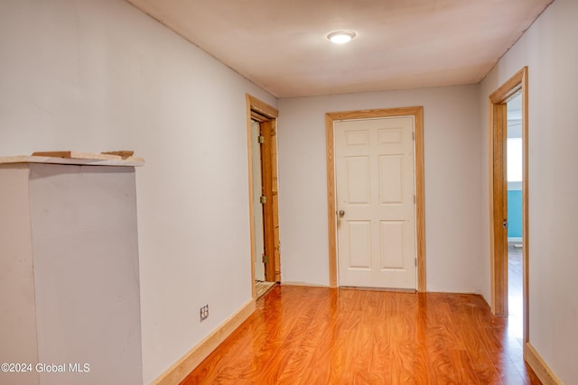 corridor featuring light hardwood / wood-style flooring