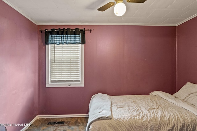 bedroom featuring ceiling fan and crown molding