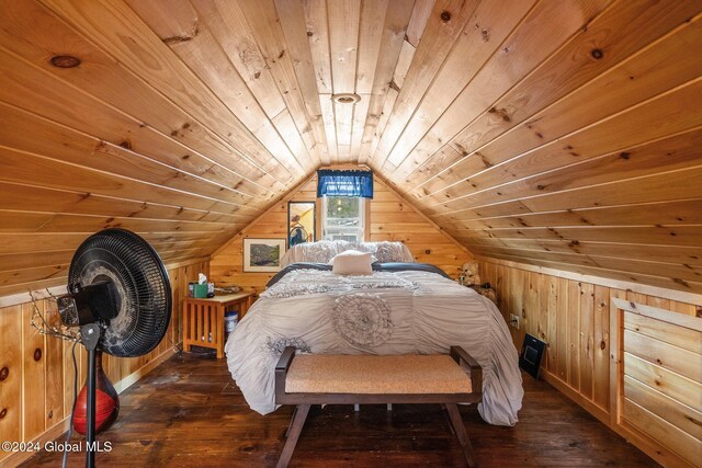 bedroom featuring wood walls, lofted ceiling, dark wood-type flooring, and wood ceiling