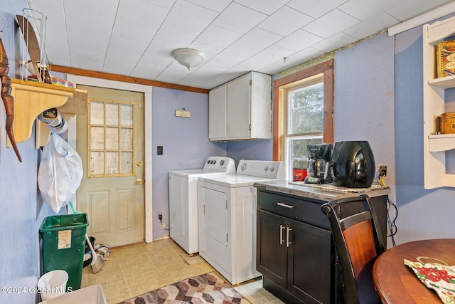 clothes washing area featuring washing machine and clothes dryer