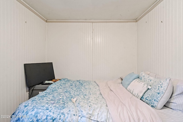 bedroom featuring ornamental molding