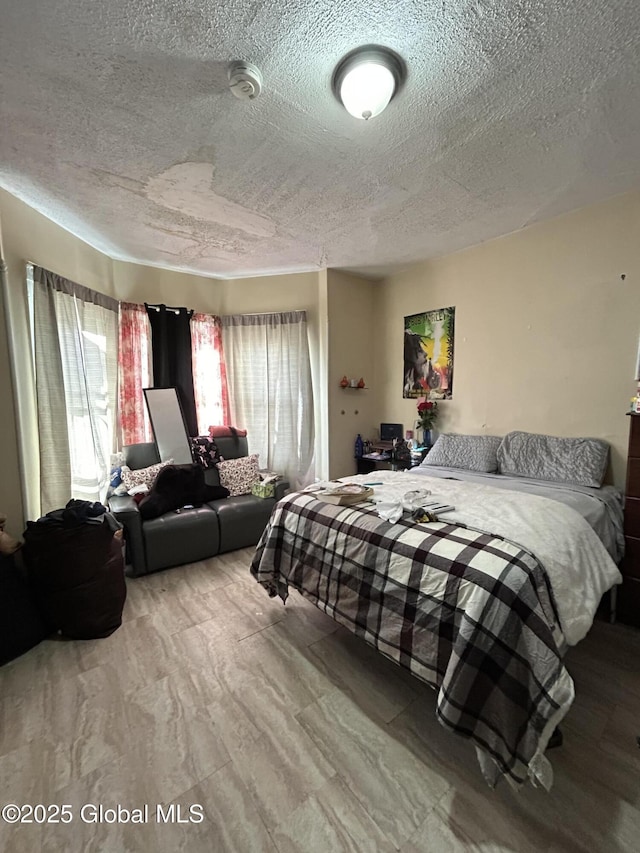 bedroom with a textured ceiling