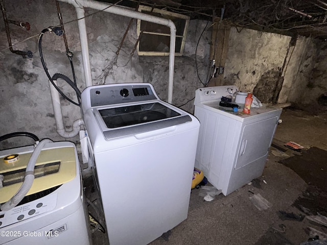 laundry area with independent washer and dryer