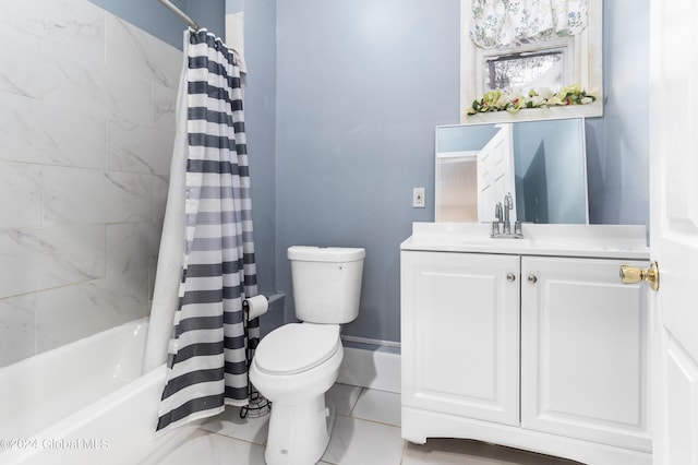 full bathroom featuring shower / bath combo, toilet, and vanity