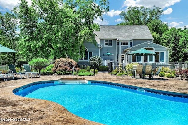 view of pool with a patio area