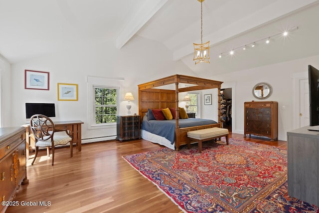 bedroom with rail lighting, hardwood / wood-style flooring, a baseboard radiator, a chandelier, and vaulted ceiling with beams