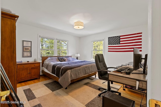 bedroom featuring light hardwood / wood-style flooring