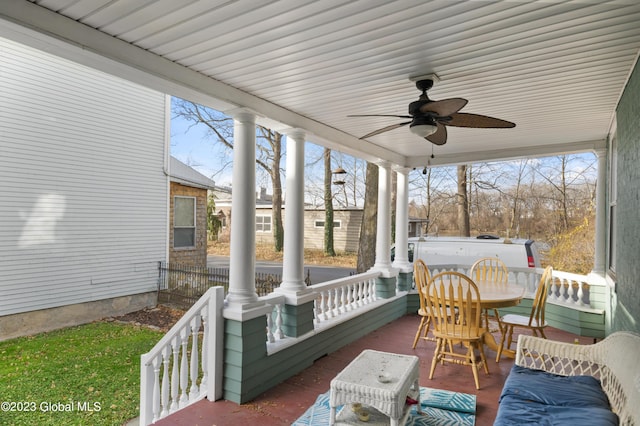 sunroom / solarium with ceiling fan