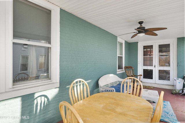 exterior space featuring ceiling fan and french doors